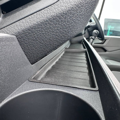 Durable rubber mats designed to fit into the lower dashboard area of a Volkswagen Crafter van, helping to protect the dashboard from
