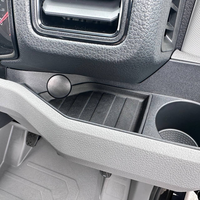 Durable rubber mats designed to fit into the lower dashboard area of a Volkswagen Crafter van, helping to protect the dashboard from