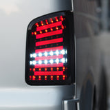 VW Transporter T5 / T5.1 Stock Replacement Rear Tail Lights with Clear Indicators - For Twin Rear Door Models VW Transporter T5 / T5.1 Stock Replacement Rear Tail Lights with Clear Indicators - For Twin Rear Door Models